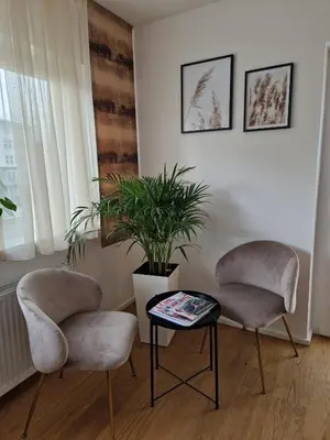 Ein Sitzbereich in der Unterkunft Wohlfühlapartment 24