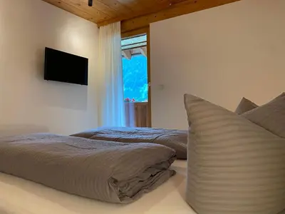 Ein Bett oder Betten in einem Zimmer der Unterkunft Haus Emma