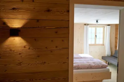 Ein Bett oder Betten in einem Zimmer der Unterkunft UNSER VORSÄSS - Geißkopf