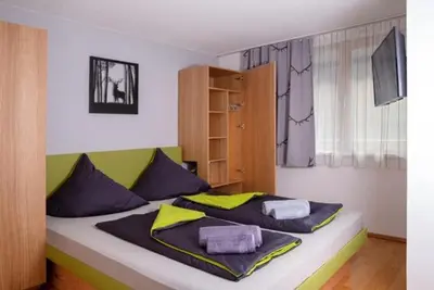 Ein Bett oder Betten in einem Zimmer der Unterkunft Mountain Deluxe