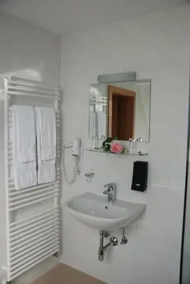 Ein Badezimmer in der Unterkunft Der Löwen, Löwen Betriebs- und Management GmbH