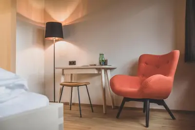 Ein Sitzbereich in der Unterkunft BOUTIQUEHOTEL das edelweiss
