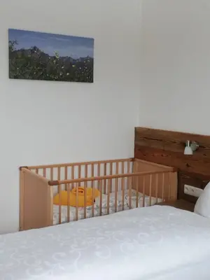 Ein Bett oder Betten in einem Zimmer der Unterkunft Ferienwohnung Anton Künzler