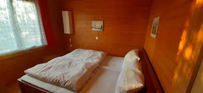 Ein Bett oder Betten in einem Zimmer der Unterkunft Ferienhaus Fernblick