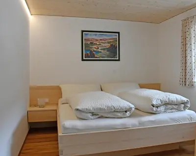 Ein Bett oder Betten in einem Zimmer der Unterkunft Felder Apartments