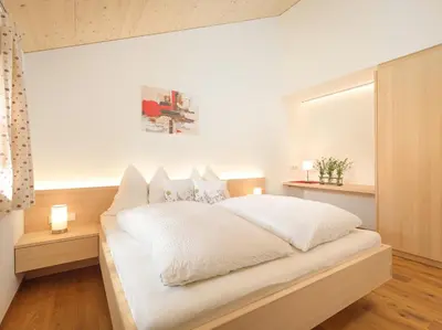 Ein Bett oder Betten in einem Zimmer der Unterkunft Felder Apartments