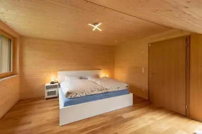 Ein Bett oder Betten in einem Zimmer der Unterkunft Rosenhaus 2
