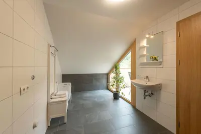 Ein Badezimmer in der Unterkunft Rosenhaus 2