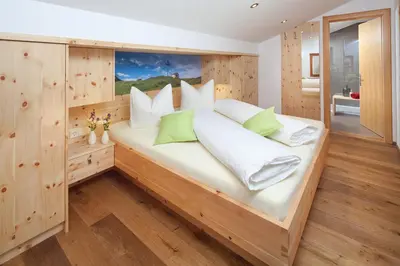 Ein Bett oder Betten in einem Zimmer der Unterkunft Aparthotel Brunnenhof