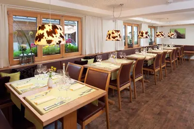 Ein Restaurant oder anderes Speiselokal in der Unterkunft Aparthotel Brunnenhof