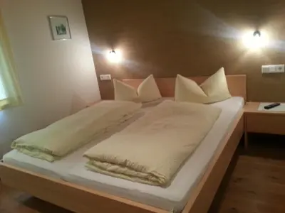Ein Bett oder Betten in einem Zimmer der Unterkunft Ferienwohnungen Abel