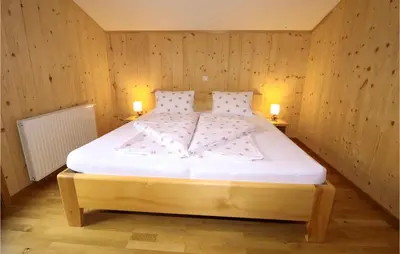 Ein Bett oder Betten in einem Zimmer der Unterkunft Moderne Ferienwohnungdalaas
