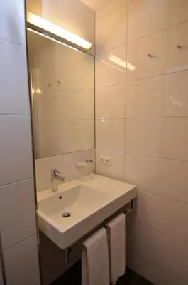 Ein Badezimmer in der Unterkunft Pension Mallaun
