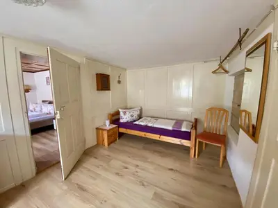 Ein Bett oder Betten in einem Zimmer der Unterkunft Rosinas Dreiländerblick
