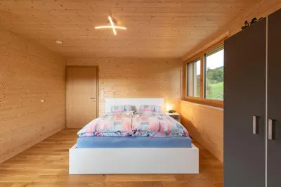 Ein Bett oder Betten in einem Zimmer der Unterkunft Rosenhaus 1