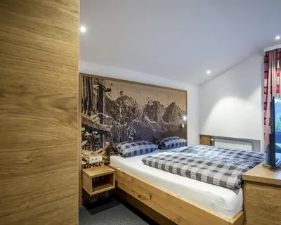 Ein Bett oder Betten in einem Zimmer der Unterkunft Gästehaus Boersch