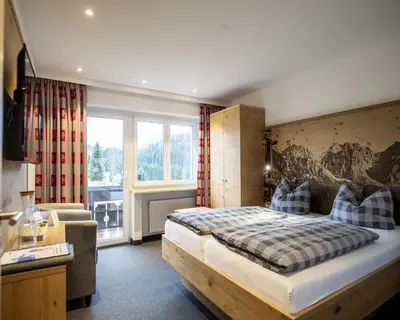 Ein Bett oder Betten in einem Zimmer der Unterkunft Gästehaus Boersch
