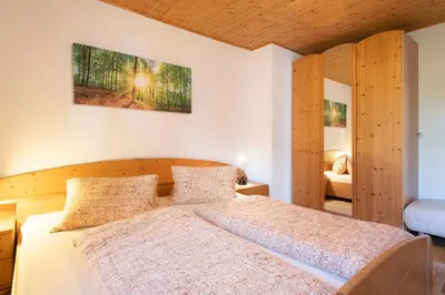 Ein Bett oder Betten in einem Zimmer der Unterkunft Ferienwohnung am Gant
