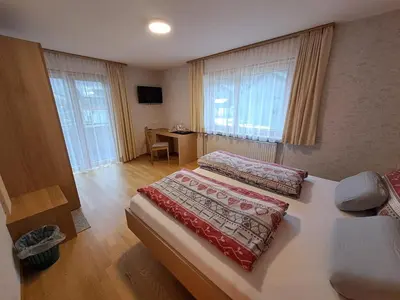 Ein Bett oder Betten in einem Zimmer der Unterkunft Gästehaus Manuela Puchmayr