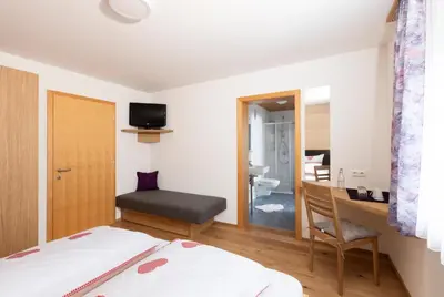 Ein Bett oder Betten in einem Zimmer der Unterkunft Gästehaus Manuela Puchmayr