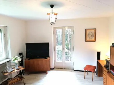 TV/Unterhaltungsangebot in der Unterkunft Dimai House 1970s