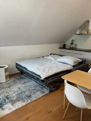 Ein Bett oder Betten in einem Zimmer der Unterkunft K10