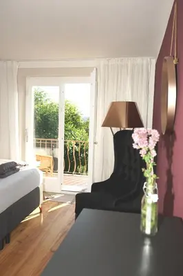 Ein Bett oder Betten in einem Zimmer der Unterkunft Haus Bregenz Apartment Bodensee
