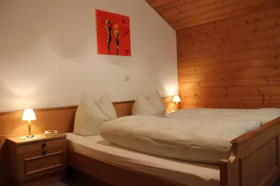 Ein Bett oder Betten in einem Zimmer der Unterkunft Haus Simma