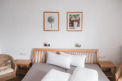 Ein Bett oder Betten in einem Zimmer der Unterkunft Sonnegg