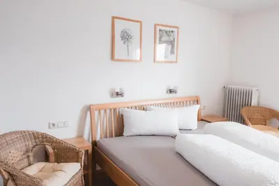 Ein Bett oder Betten in einem Zimmer der Unterkunft Sonnegg