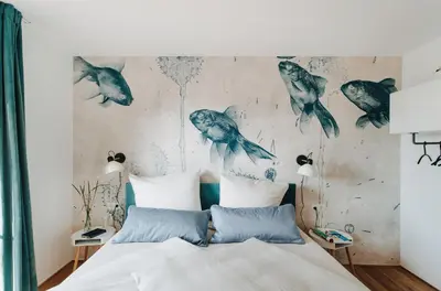Ein Bett oder Betten in einem Zimmer der Unterkunft Rotes Haus Bregenz See Wohnung