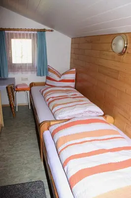 Ein Bett oder Betten in einem Zimmer der Unterkunft Ferienwohnung Bickel