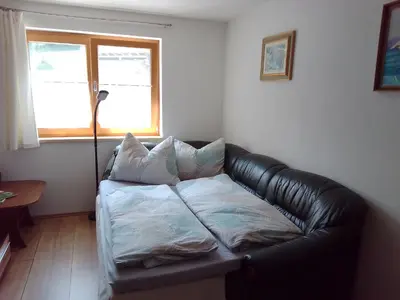 Ein Bett oder Betten in einem Zimmer der Unterkunft Ferienwohnung Maari