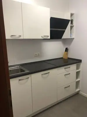 Küche/Küchenzeile in der Unterkunft Groot appartement in Aparthotel met prachtig uitzicht