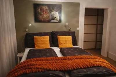 Ein Bett oder Betten in einem Zimmer der Unterkunft Haus Bregenz Apartment Festspiele