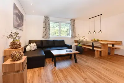 Ein Sitzbereich in der Unterkunft Ferienwohnung Saxenhammer