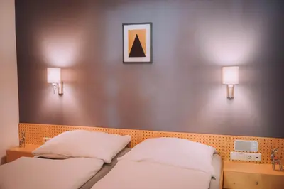 Ein Bett oder Betten in einem Zimmer der Unterkunft Apartment Auenfeld Widderstein