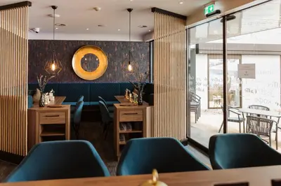 Ein Sitzbereich in der Unterkunft Hotel Kaiser