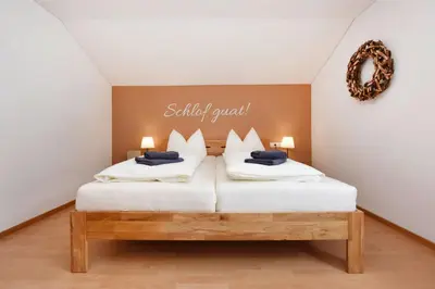 Ein Bett oder Betten in einem Zimmer der Unterkunft Ferienwohnung Frömlig