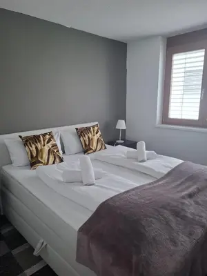 Ein Bett oder Betten in einem Zimmer der Unterkunft Blickfang am See