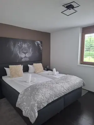 Ein Bett oder Betten in einem Zimmer der Unterkunft Blickfang am See