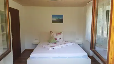 Ein Bett oder Betten in einem Zimmer der Unterkunft Ferienhus Klus 415