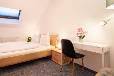 Ein Bett oder Betten in einem Zimmer der Unterkunft Haus Sahin