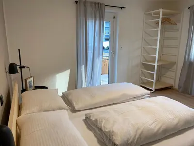 Ein Bett oder Betten in einem Zimmer der Unterkunft WOHNUNG ERDGESCHOSS mit 3 Schlafzimmer in ruhiger Gegend