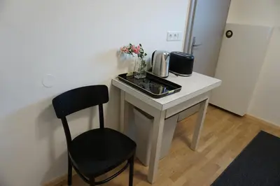 TV/Unterhaltungsangebot in der Unterkunft WOHNUNG ERDGESCHOSS mit 3 Schlafzimmer in ruhiger Gegend