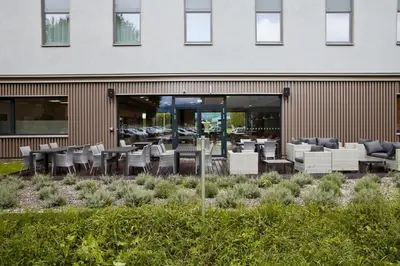 Ein Restaurant oder anderes Speiselokal in der Unterkunft Holiday Inn Express - Lustenau