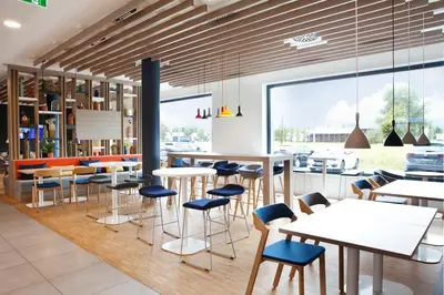 Ein Restaurant oder anderes Speiselokal in der Unterkunft Holiday Inn Express - Lustenau