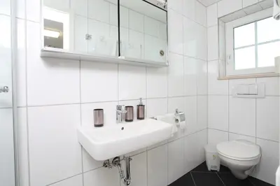 Ein Badezimmer in der Unterkunft Gästehaus Scherrer
