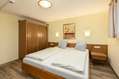 Ein Bett oder Betten in einem Zimmer der Unterkunft IFA Breitach Apartments Kleinwalsertal