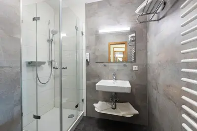 Ein Badezimmer in der Unterkunft IFA Breitach Apartments Kleinwalsertal
